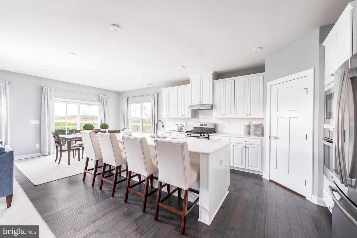 Dining room, Interior, Kitchen, Recessed Lighting, Stainless Steel Appliances, Wood Texture Flooring