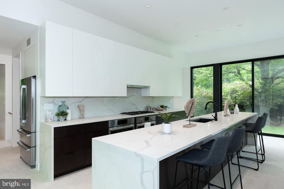 Interior, Kitchen, Marble Walls, Recessed Lighting, Stainless Steel Appliances