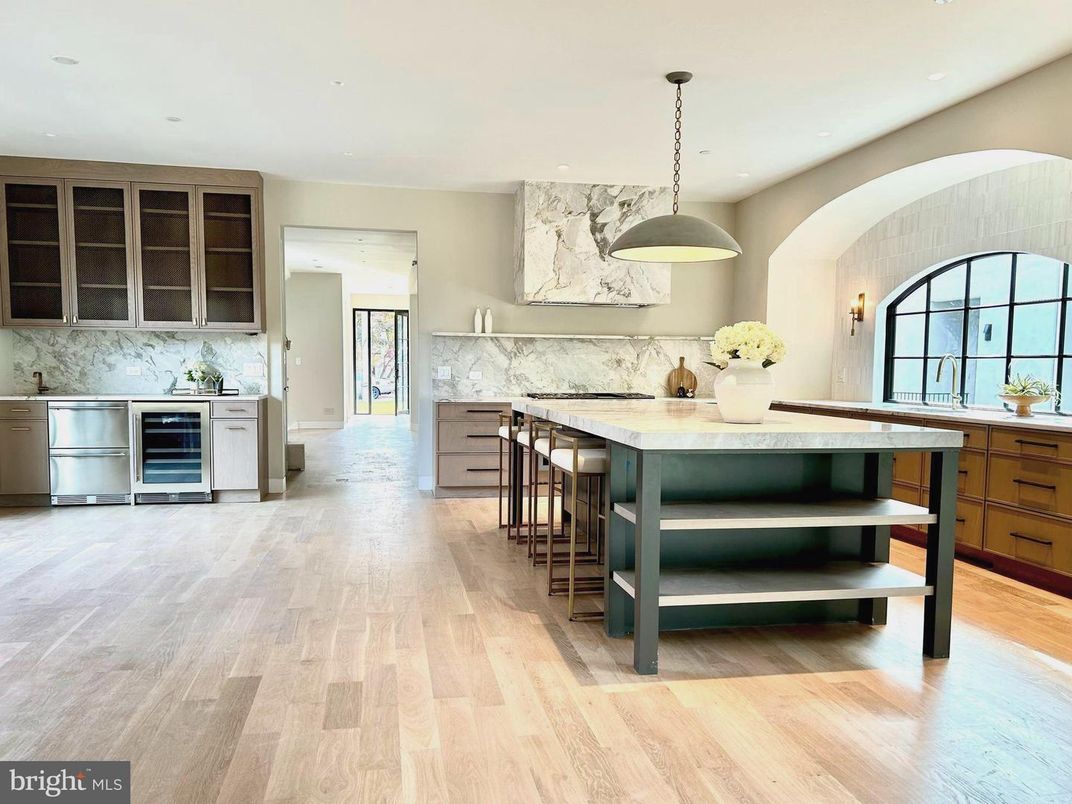Interior, Kitchen, Marble Walls, Pendant Lights, Recessed Lighting, Stainless Steel Appliances, Wood Texture Flooring