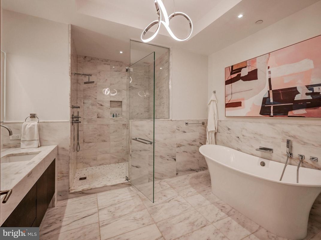 Bathroom, Dual Sink Vanities, Free Standing Baths, Glass Shower, Interior, Marble, Marble Walls, Pendant Lights, Recessed Lighting