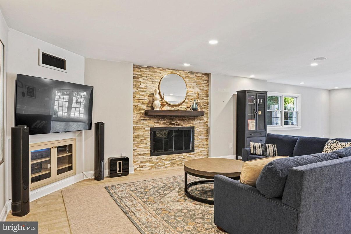 Fireplace, Interior, Living room, Recessed Lighting, Stone Walls, Wood Texture Flooring