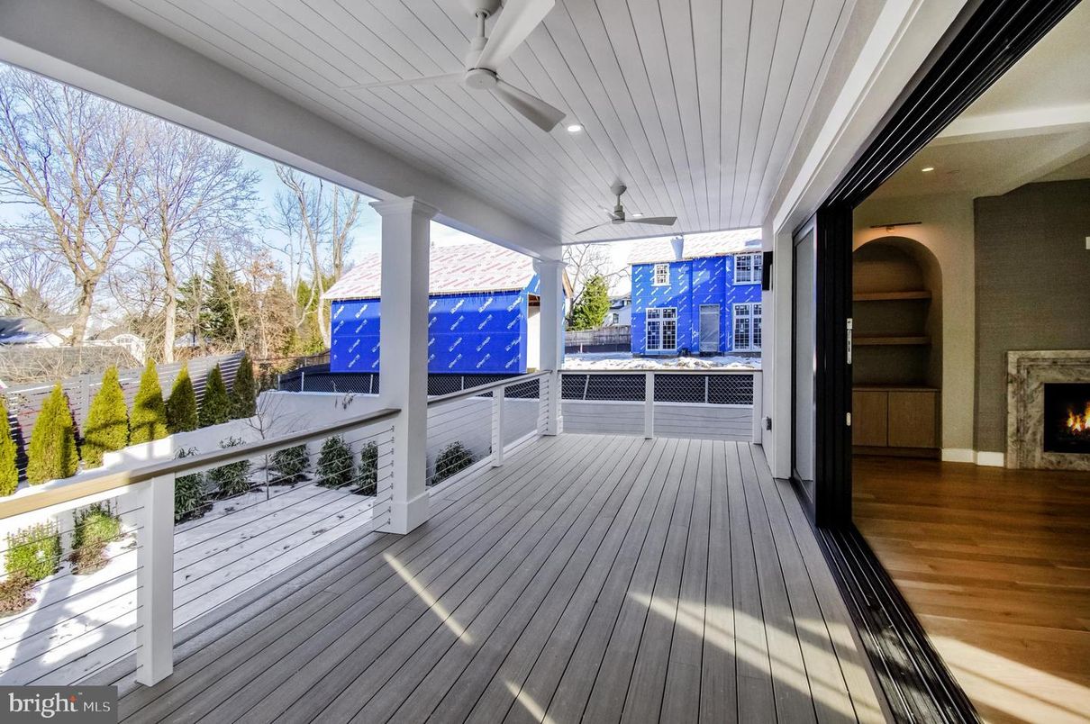 Exterior, Fireplace, Wood Texture Flooring