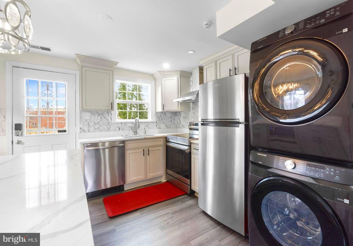 Interior, Kitchen, Recessed Lighting, Stainless Steel Appliances, Washer, Wood Texture Flooring
