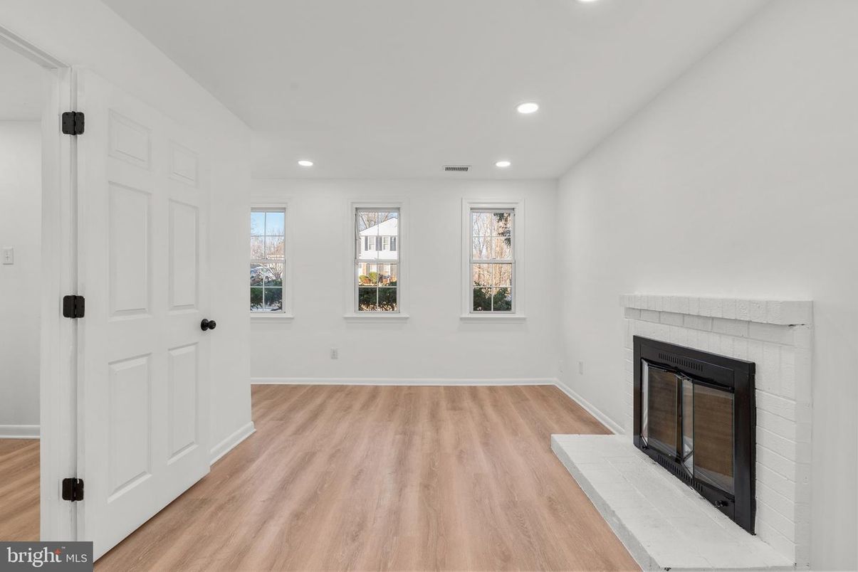 Empty room, Fireplace, Interior, Recessed Lighting, Wood Texture Flooring