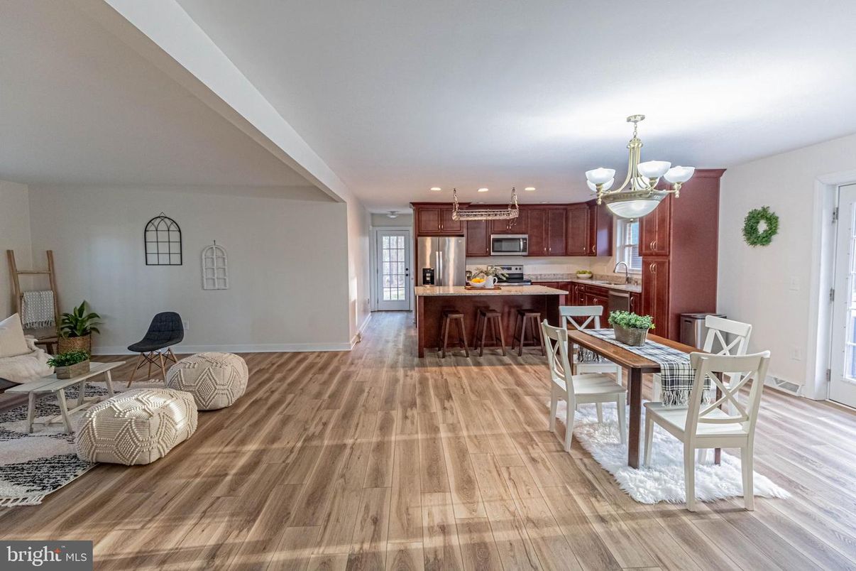 Chandelier, Dining room, Interior, Kitchen, Recessed Lighting, Stainless Steel Appliances, Wood Texture Flooring