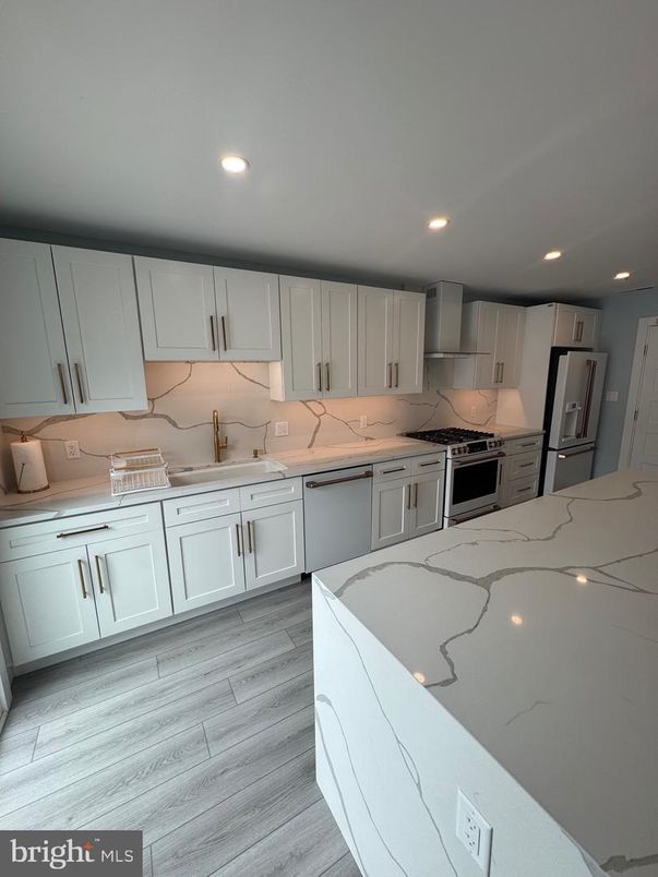 Interior, Kitchen, Marble Walls, Recessed Lighting, Wood Texture Flooring