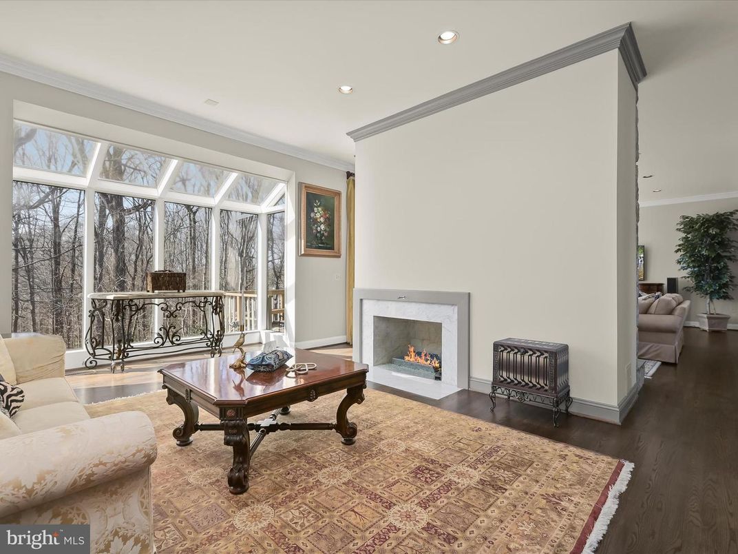 Fireplace, Interior, Living room, Recessed Lighting, Sun Room, Wood Texture Flooring