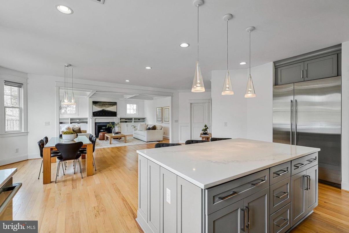 Dining room, Fireplace, Interior, Kitchen, Living room, Pendant Lights, Recessed Lighting, Stainless Steel Appliances, Wood Texture Flooring