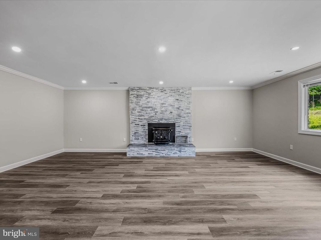 Empty room, Fireplace, Interior, Recessed Lighting, Wood Texture Flooring