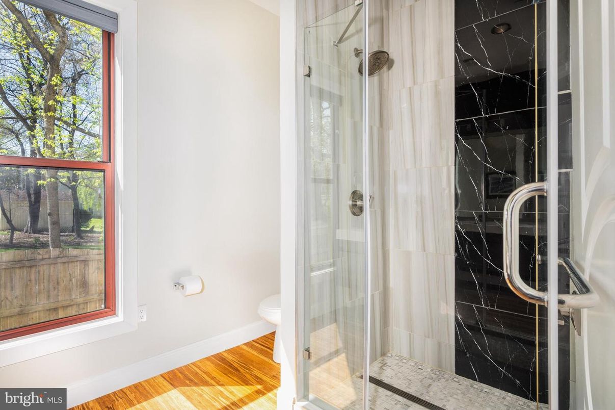 Bathroom, Glass Shower, Interior, Marble Walls, Wood Texture Flooring