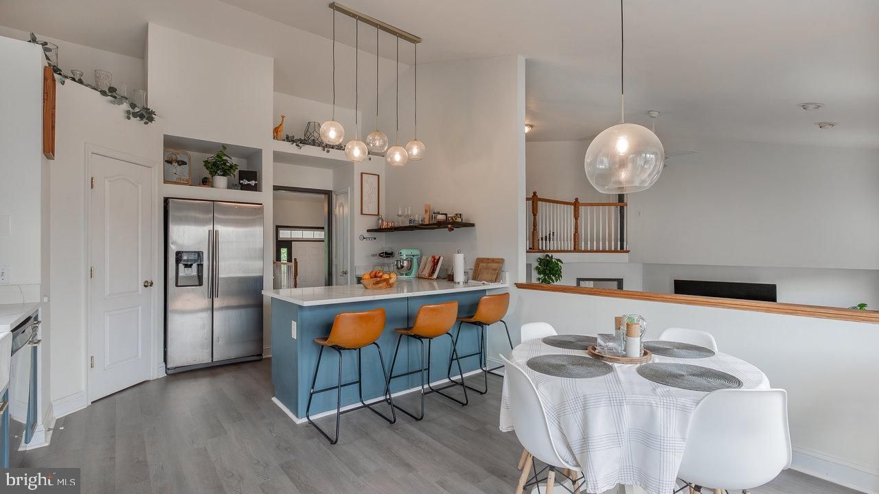 Dining room, Interior, Kitchen, Pendant Lights, Stainless Steel Appliances, Wood Texture Flooring