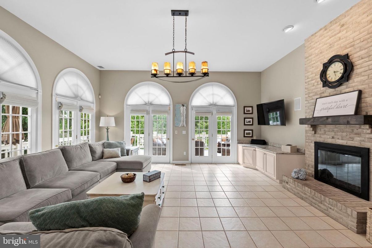 Chandelier, Fireplace, Interior, Living room, Recessed Lighting, Stone Walls