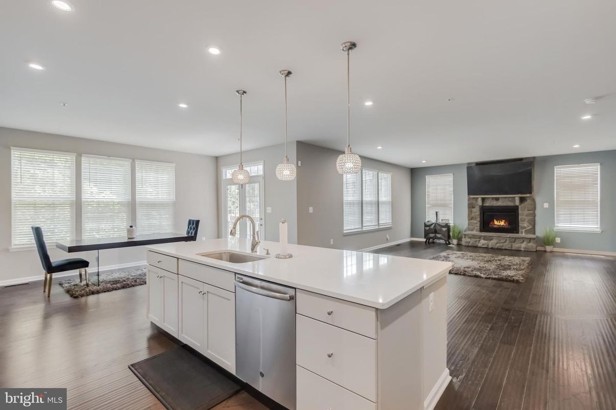 Dining room, Fireplace, Interior, Kitchen, Living room, Pendant Lights, Recessed Lighting, Wood Texture Flooring