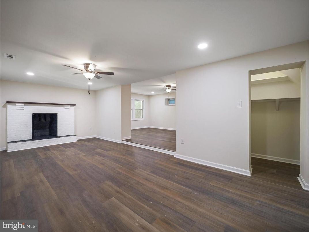 Empty room, Fireplace, Interior, Recessed Lighting, Wood Texture Flooring
