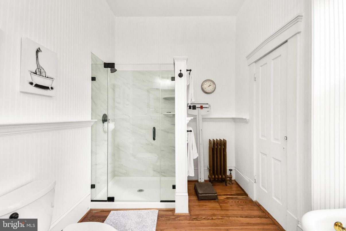 Bathroom, Glass Shower, Interior, Marble Walls, Wood Texture Flooring