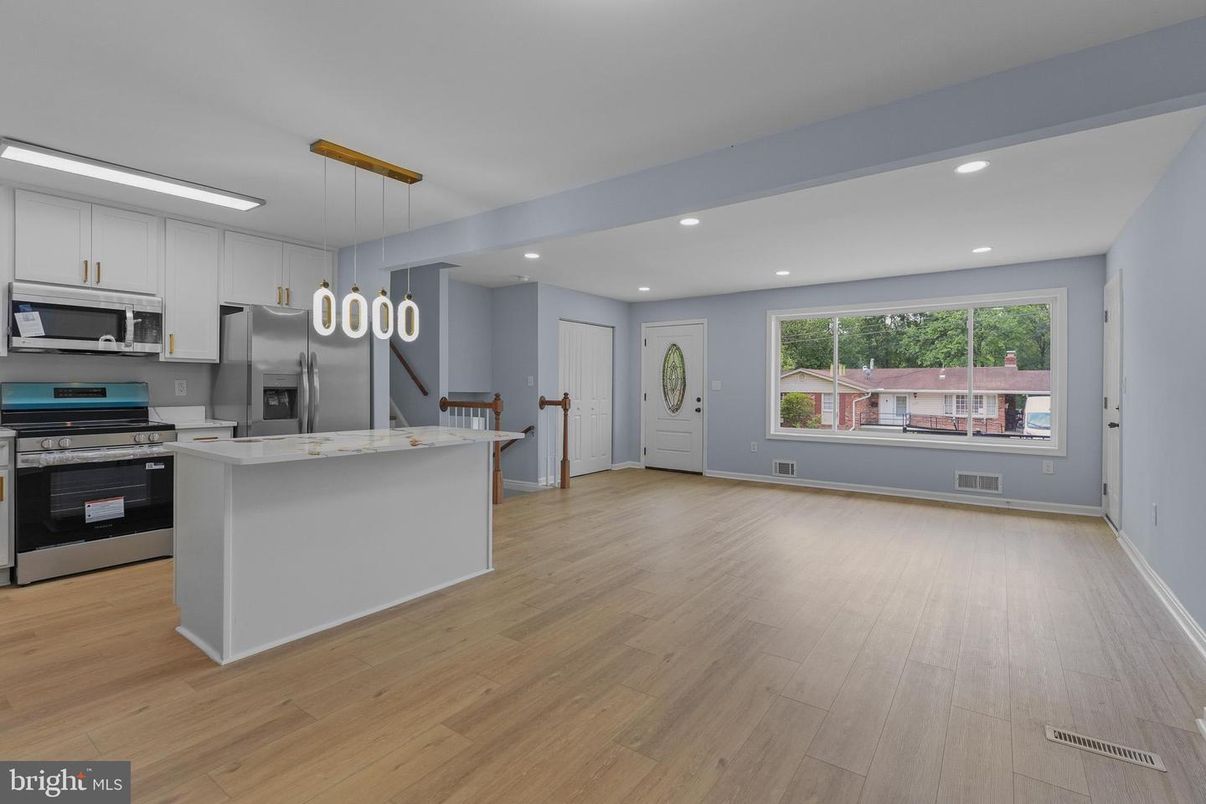 Interior, Kitchen, Pendant Lights, Recessed Lighting, Stainless Steel Appliances, Wood Texture Flooring