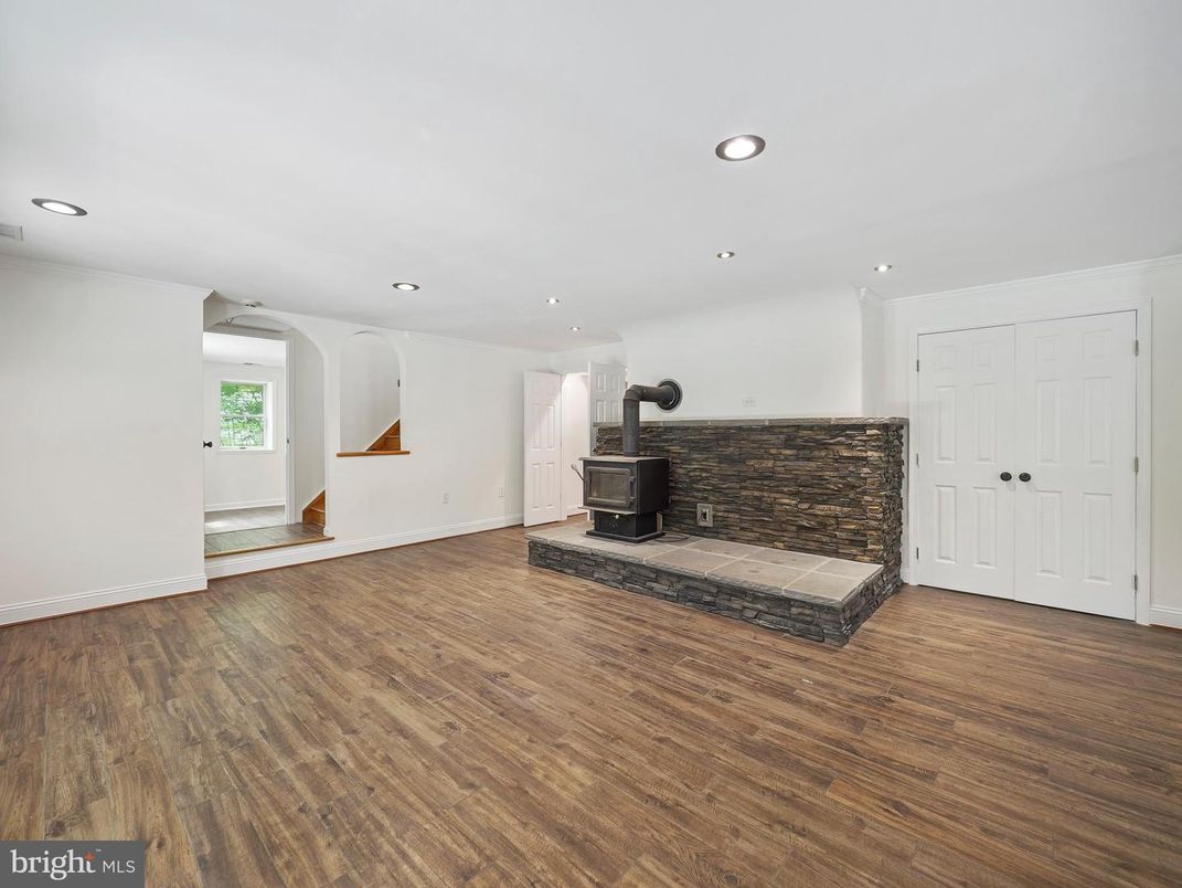 Empty room, Fireplace, Interior, Recessed Lighting, Wood Texture Flooring
