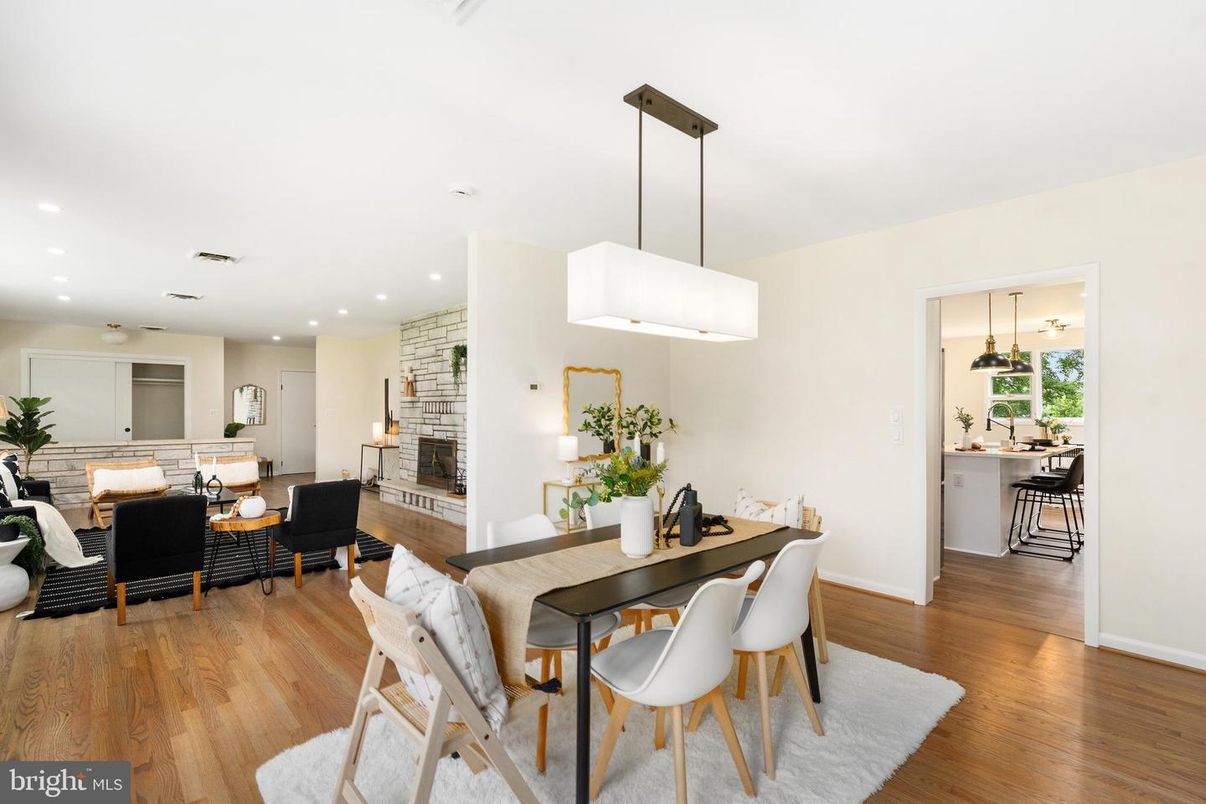 Dining room, Fireplace, Interior, Living room, Pendant Lights, Recessed Lighting, Wood Texture Flooring