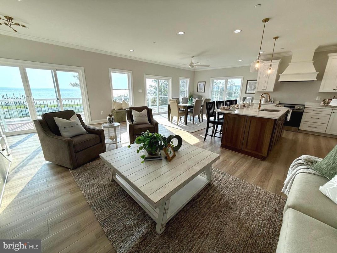Dining room, Interior, Kitchen, Living room, Pendant Lights, Recessed Lighting, Water, Wood Texture Flooring