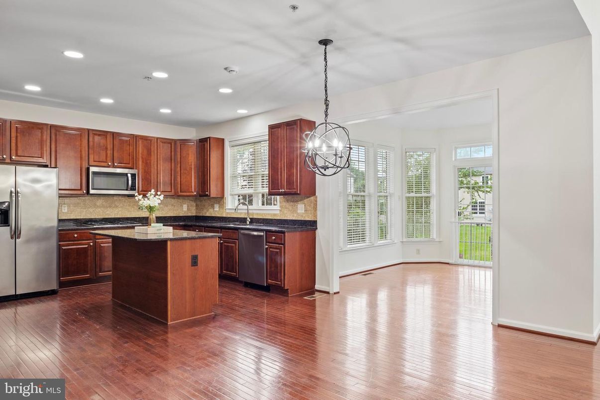 Chandelier, Interior, Kitchen, Pendant Lights, Recessed Lighting, Stainless Steel Appliances, Wood Texture Flooring