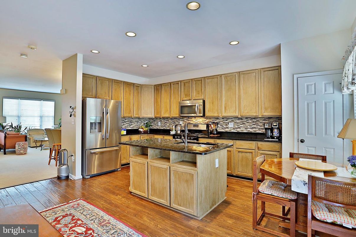 Dining room, Interior, Kitchen, Recessed Lighting, Stainless Steel Appliances, Wood Texture Flooring