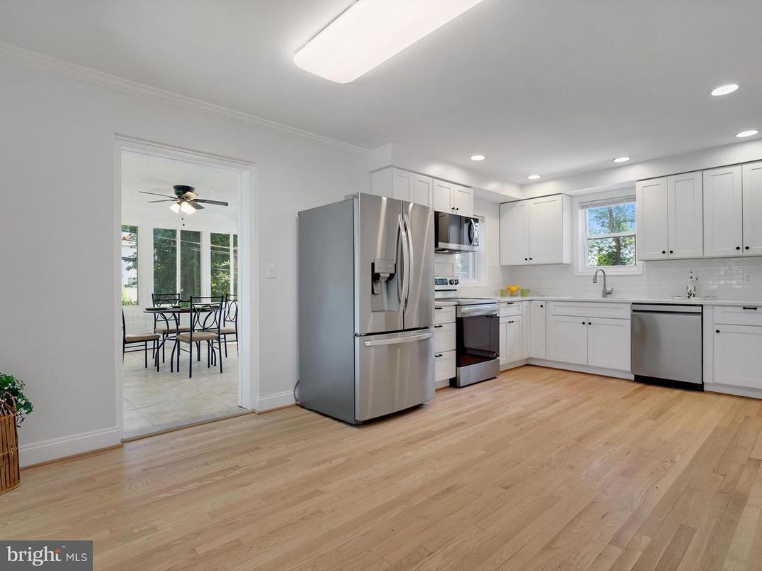 Dining room, Interior, Kitchen, Recessed Lighting, Stainless Steel Appliances, Wood Texture Flooring
