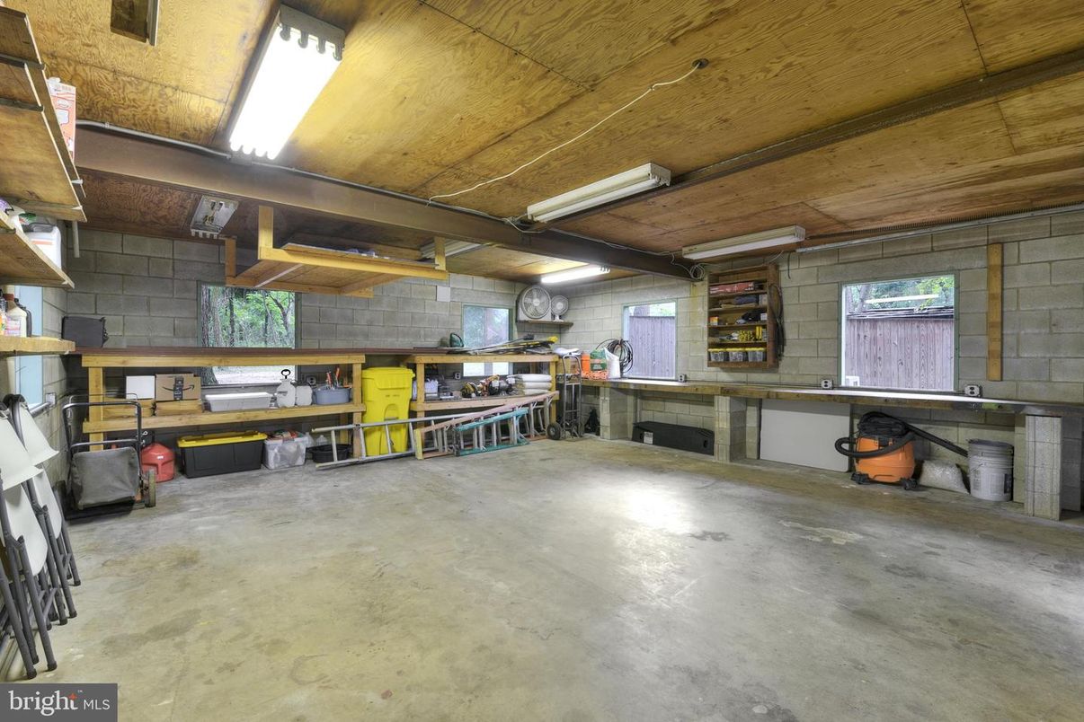 Garage, Interior, Stone Walls, Wooden Beams