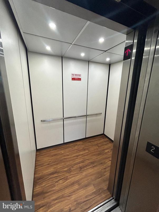 Elevator, Interior, Recessed Lighting, Wood Texture Flooring