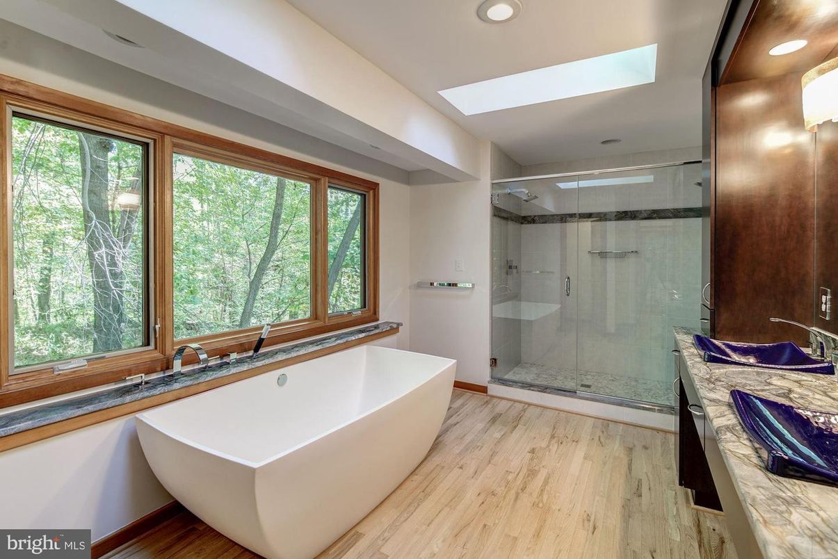 Bathroom, Free Standing Baths, Glass Shower, Interior, Recessed Lighting, Wood Texture Flooring
