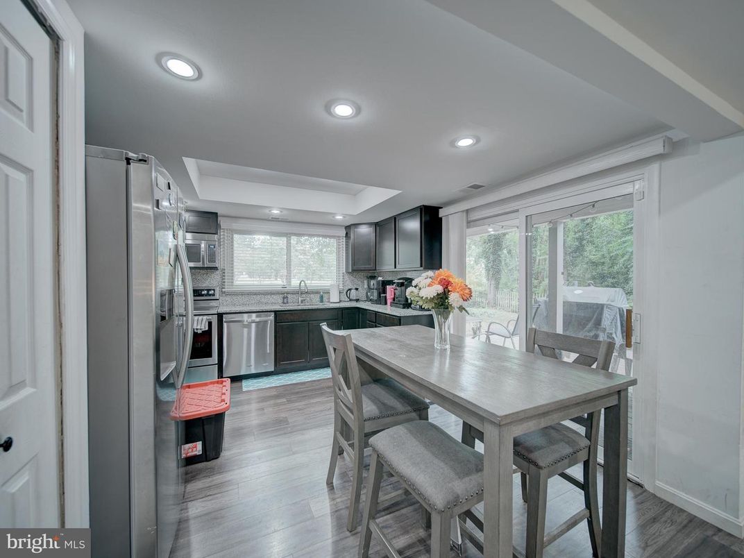 Dining room, Interior, Kitchen, Recessed Lighting, Stainless Steel Appliances, Wood Texture Flooring