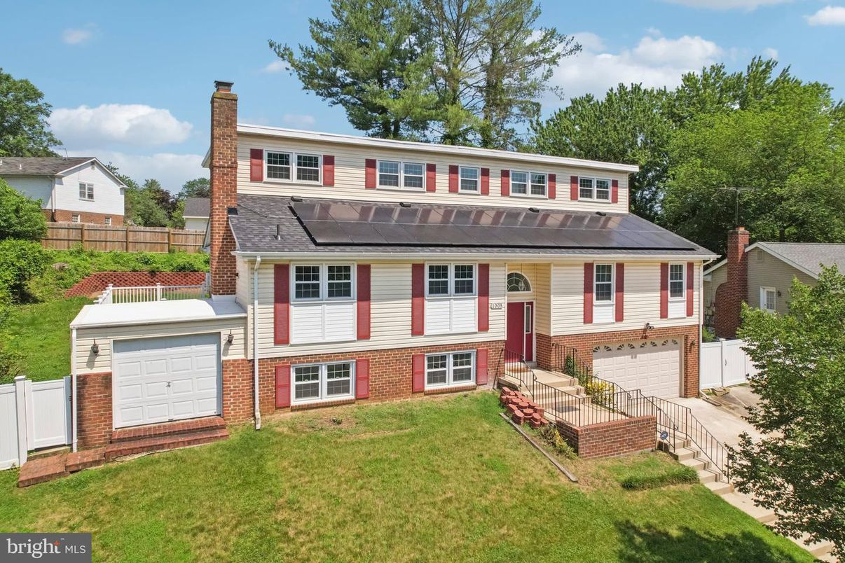 Attached, Exterior, Facade, Brick Facade, Solar Panels, Raised Ranch