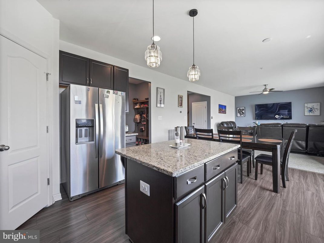 Dining room, Interior, Kitchen, Living room, Pendant Lights, Recessed Lighting, Stainless Steel Appliances, Wood Texture Flooring