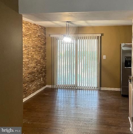 Empty room, Interior, Pendant Lights, Stainless Steel Appliances, Stone Walls, Wood Texture Flooring