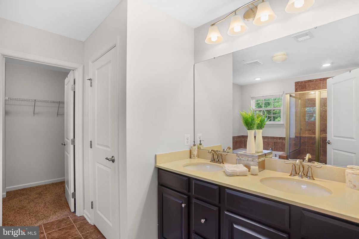 Bathroom, Dual Sink Vanities, Glass Shower, Interior, Recessed Lighting, Walk-in Closets