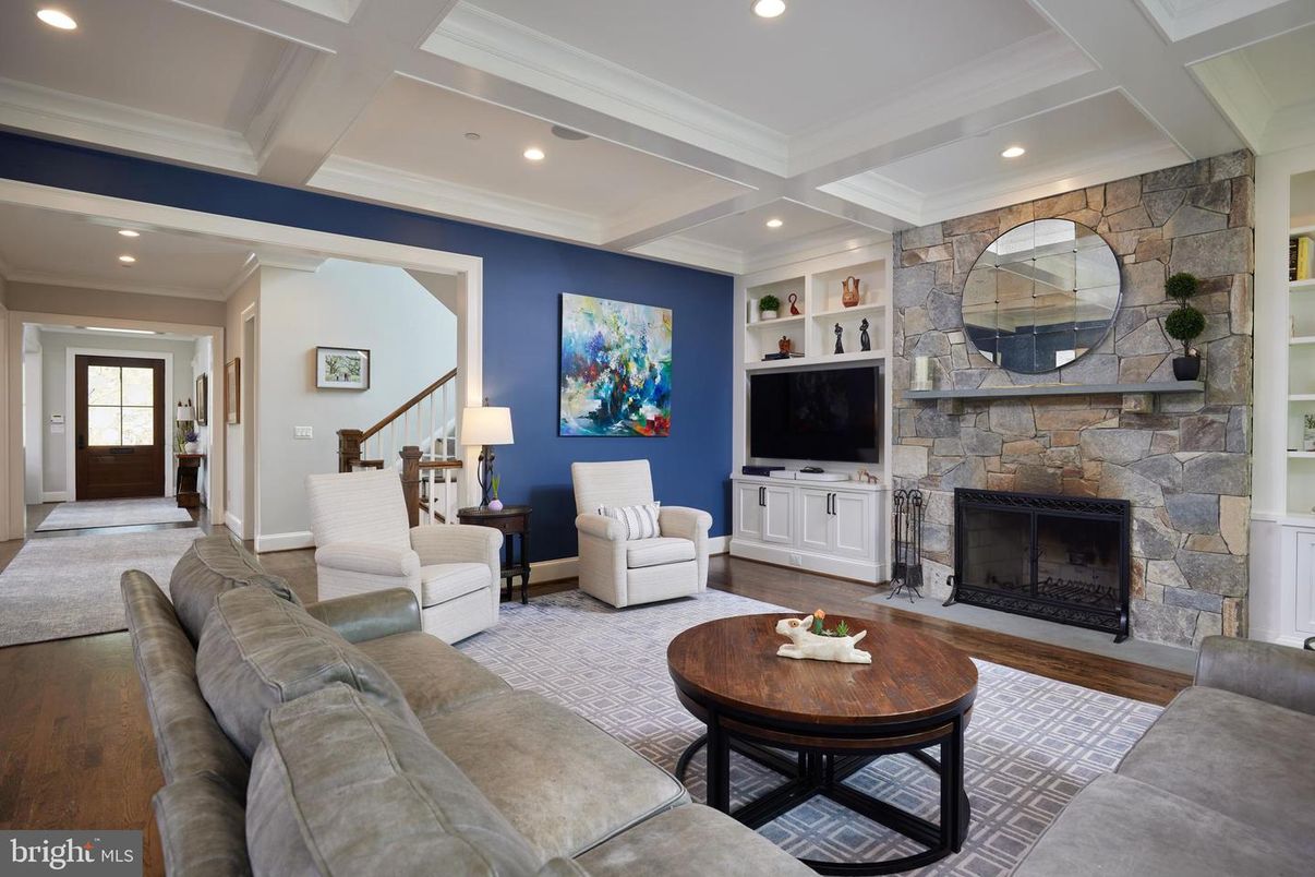 Fireplace, Interior, Living room, Recessed Lighting, Stone Walls, Wood Texture Flooring