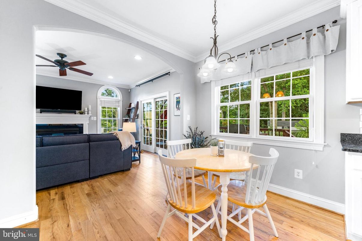 Dining room, Fireplace, Interior, Pendant Lights, Recessed Lighting, Wood Texture Flooring