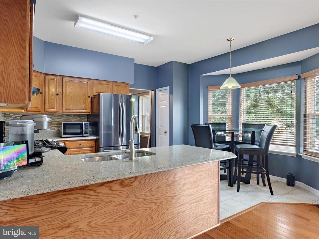 Dining room, Interior, Kitchen, Pendant Lights, Stainless Steel Appliances, Wood Texture Flooring