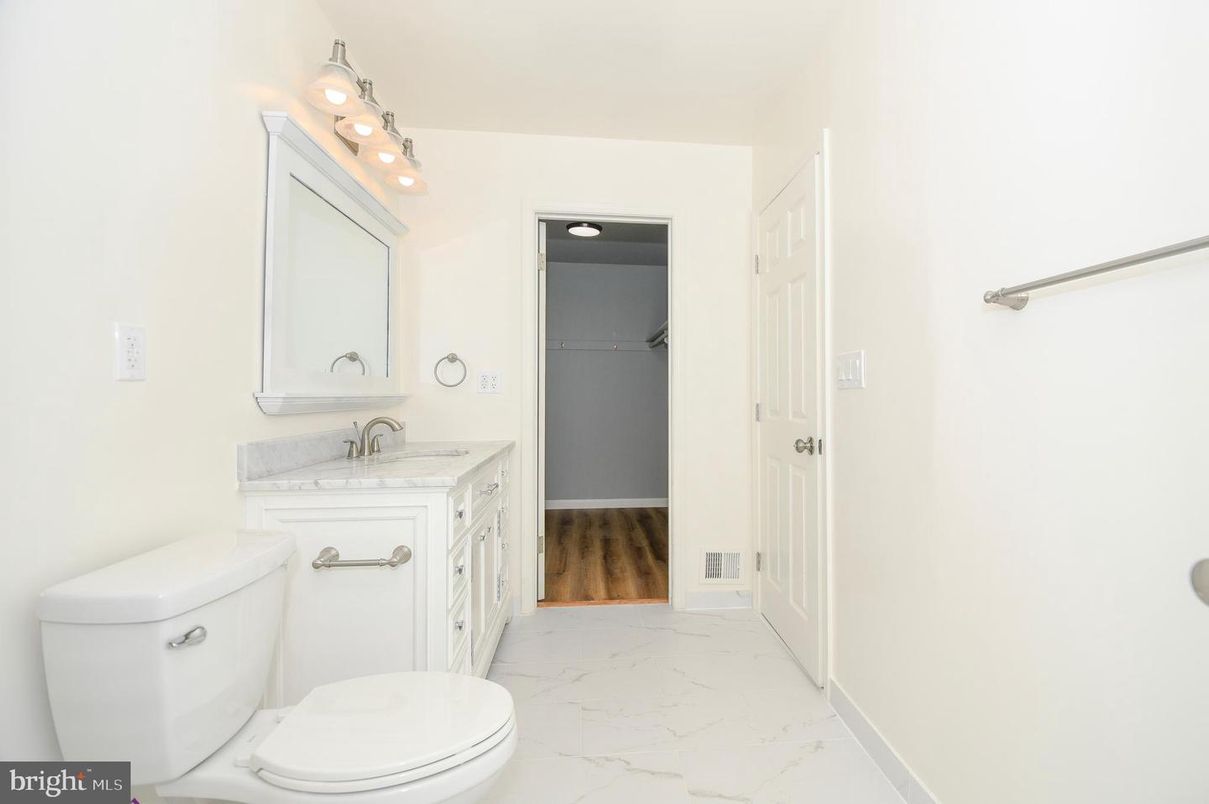 Bathroom, Dual Sink Vanities, Interior, Marble, Wood Texture Flooring