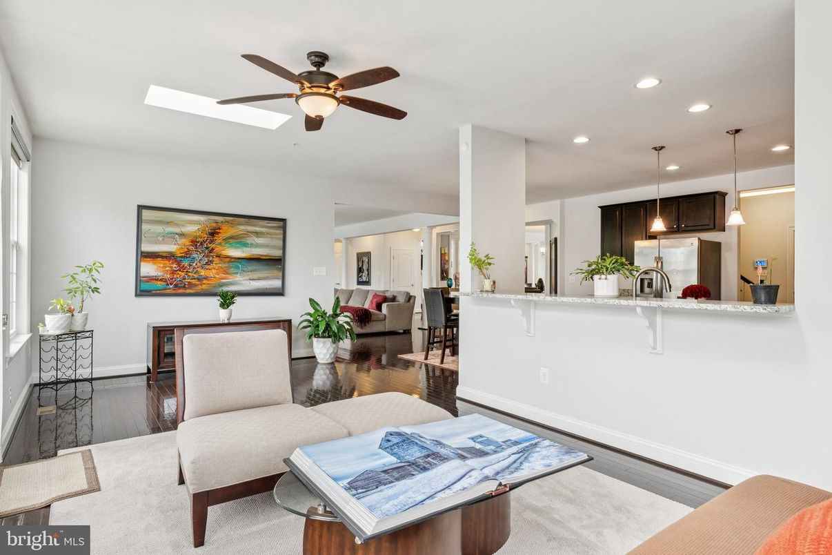 Dining room, Interior, Kitchen, Living room, Pendant Lights, Recessed Lighting, Stainless Steel Appliances, Wood Texture Flooring