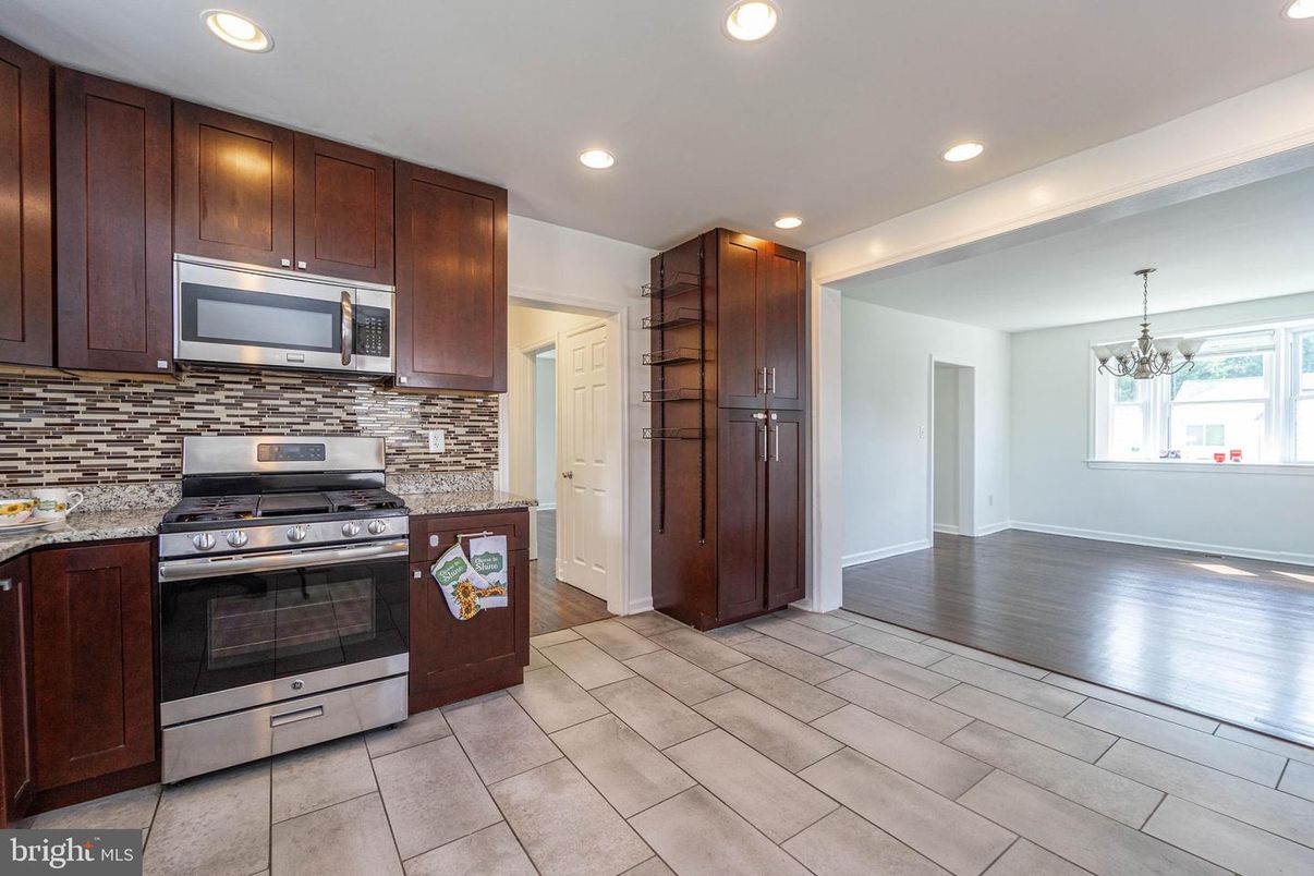 Chandelier, Interior, Kitchen, Recessed Lighting, Stainless Steel Appliances, Wood Texture Flooring