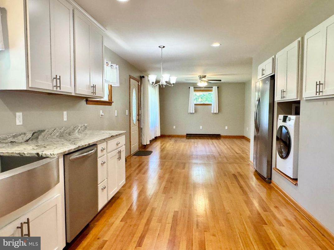 Chandelier, Interior, Kitchen, Recessed Lighting, Washer, Wood Texture Flooring