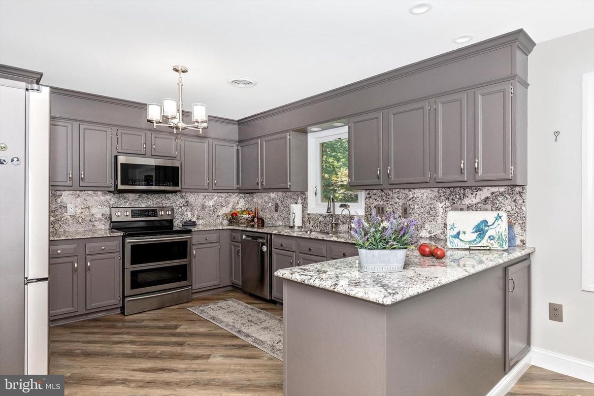 Chandelier, Interior, Kitchen, Pendant Lights, Recessed Lighting, Stainless Steel Appliances, Wood Texture Flooring