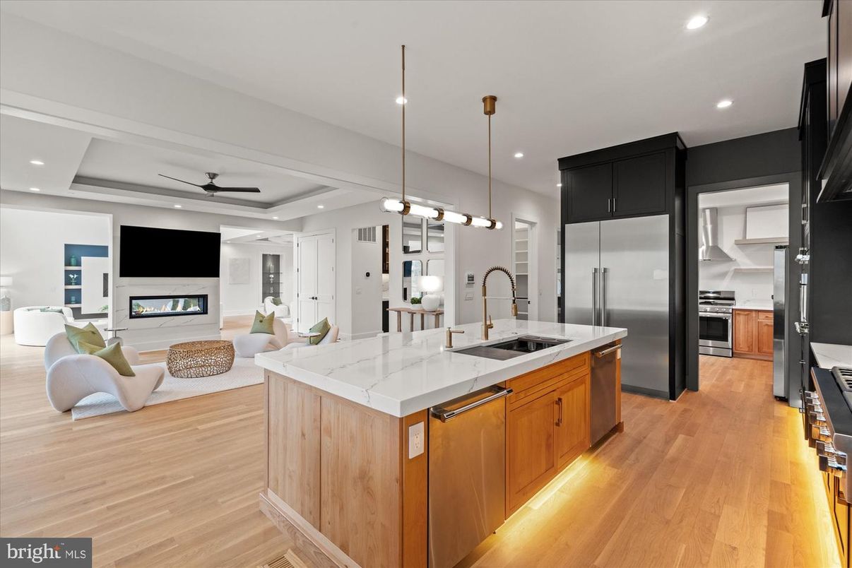 Fireplace, Interior, Kitchen, Living room, Pendant Lights, Recessed Lighting, Stainless Steel Appliances, Wood Texture Flooring