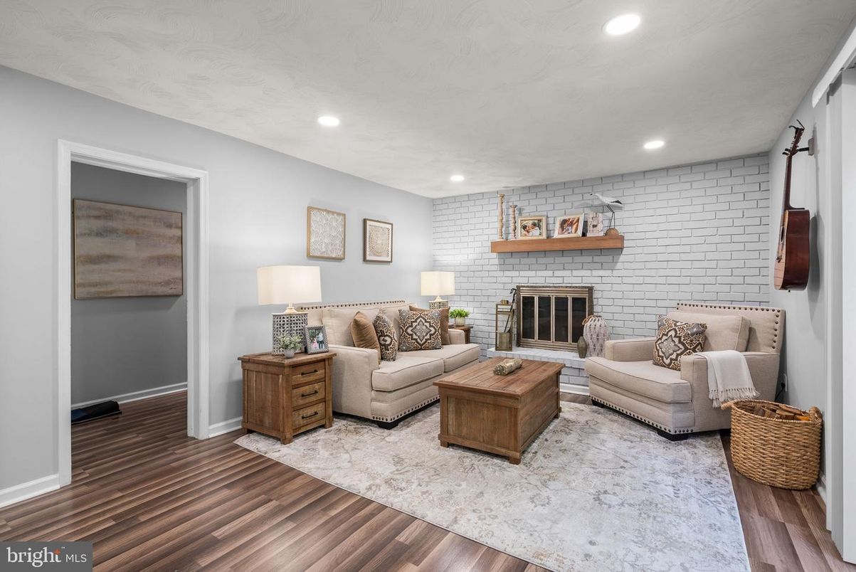 Fireplace, Interior, Living room, Recessed Lighting, Stone Walls, Wood Texture Flooring