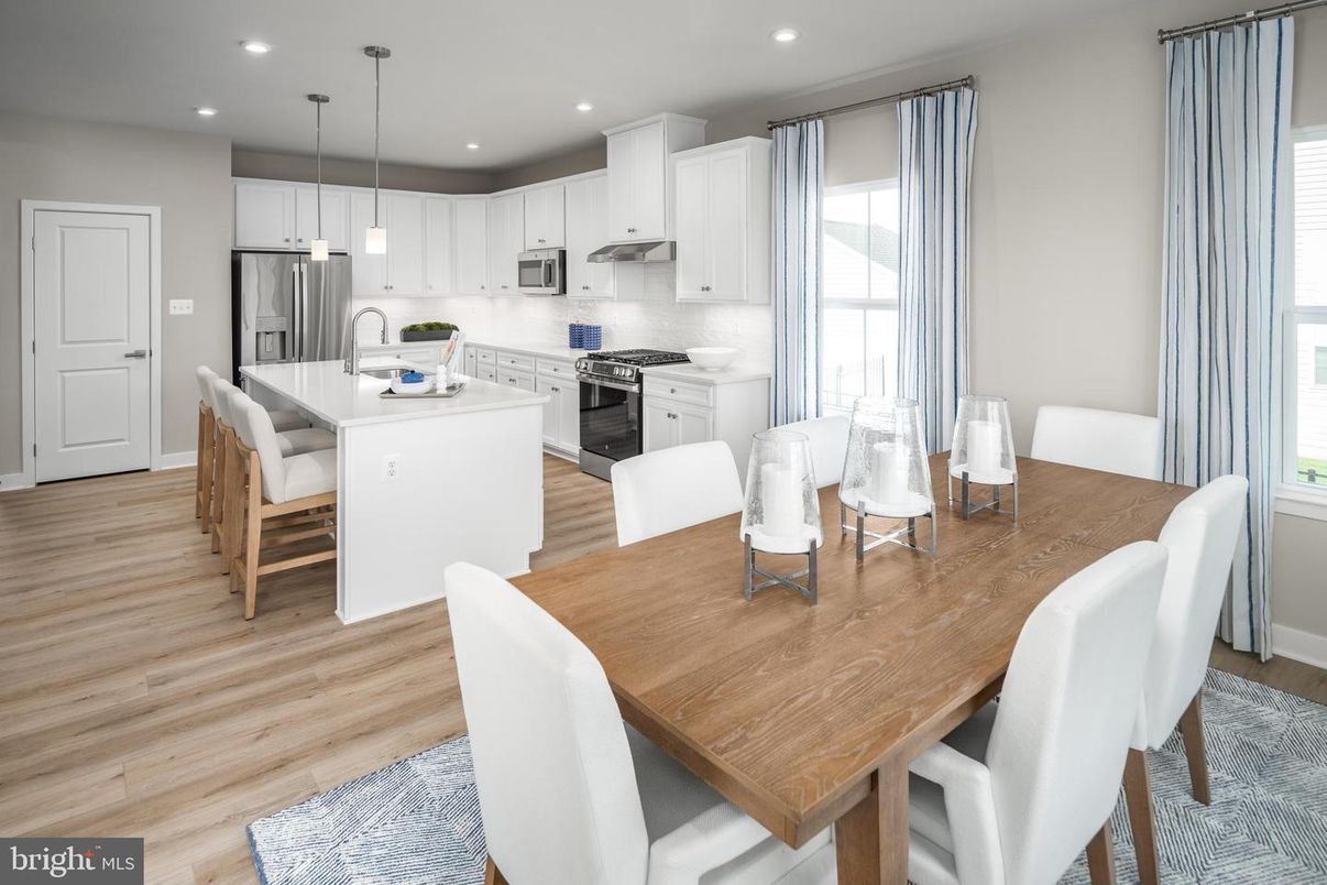 Dining room, Interior, Kitchen, Pendant Lights, Recessed Lighting, Stainless Steel Appliances, Wood Texture Flooring