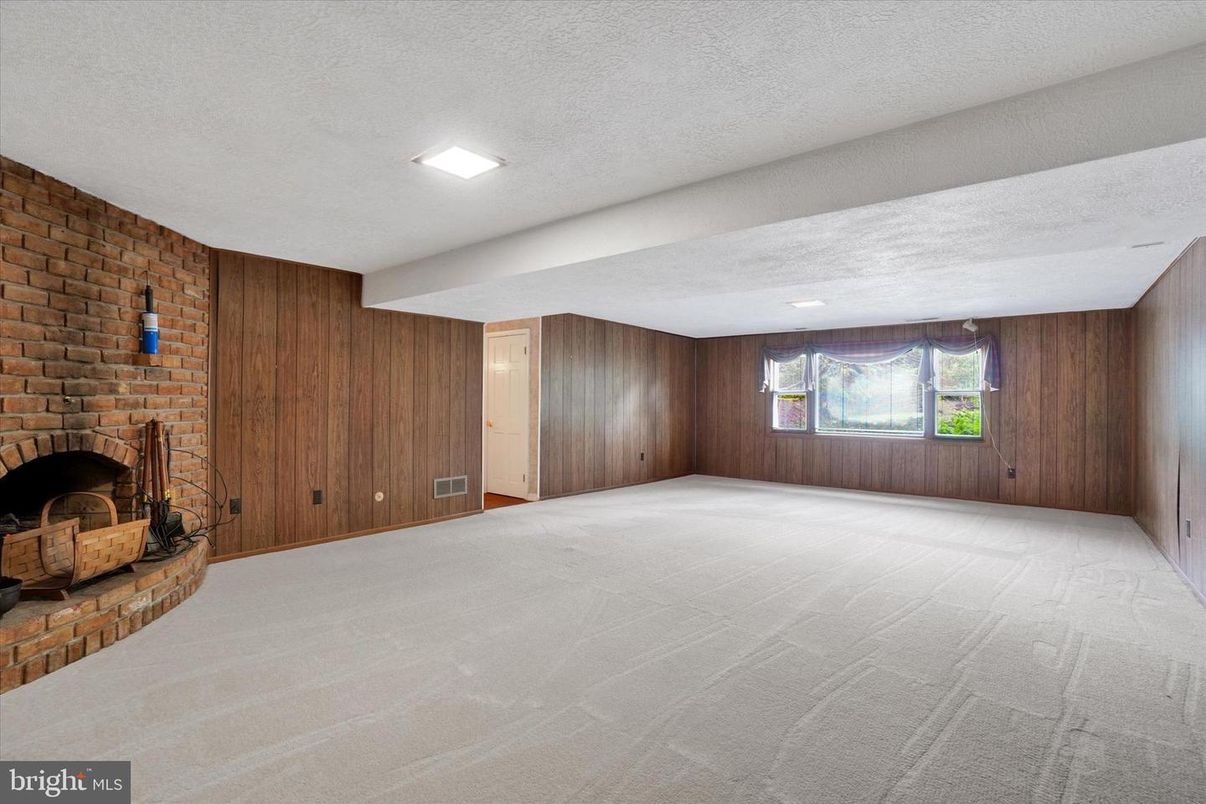 Empty room, Fireplace, Interior, Recessed Lighting, Stone Walls, Wooden Walls
