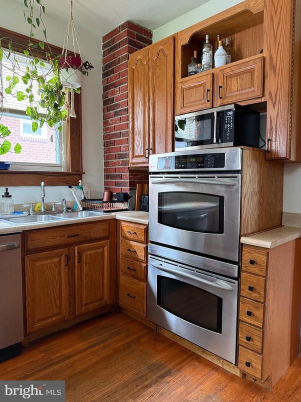 Interior, Kitchen, Stainless Steel Appliances, Stone Walls, Wood Texture Flooring