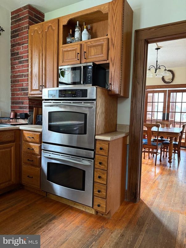 Dining room, Interior, Kitchen, Stainless Steel Appliances, Stone Walls, Wood Texture Flooring
