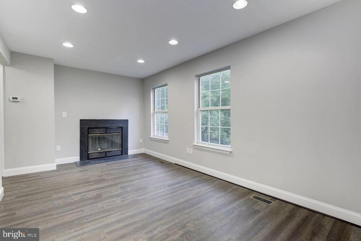 Empty room, Fireplace, Interior, Recessed Lighting, Wood Texture Flooring