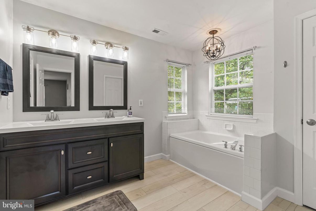 Bathroom, Chandelier, Dual Sink Vanities, Interior, Wood Texture Flooring